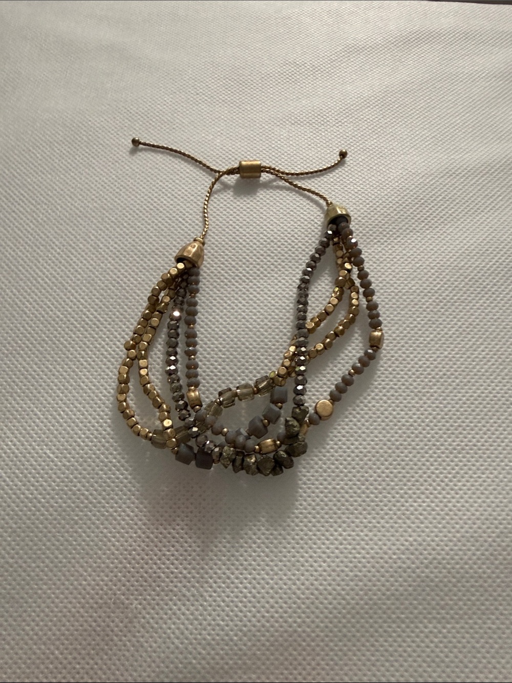 Layered Gold and Gray Beaded Bracelet with Adjustable Slide